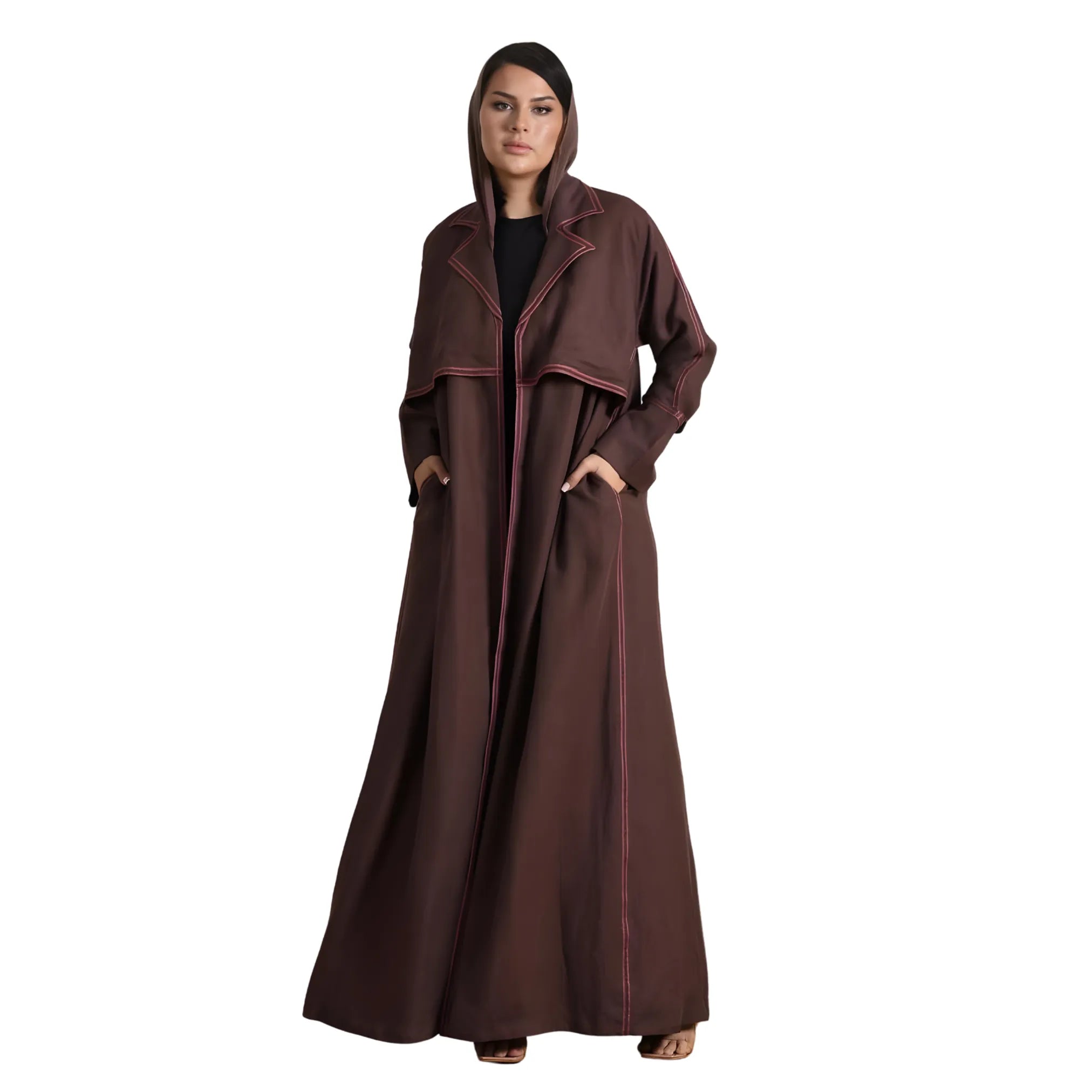 Woman wearing a long brown coat Abaya with a hood on a white background