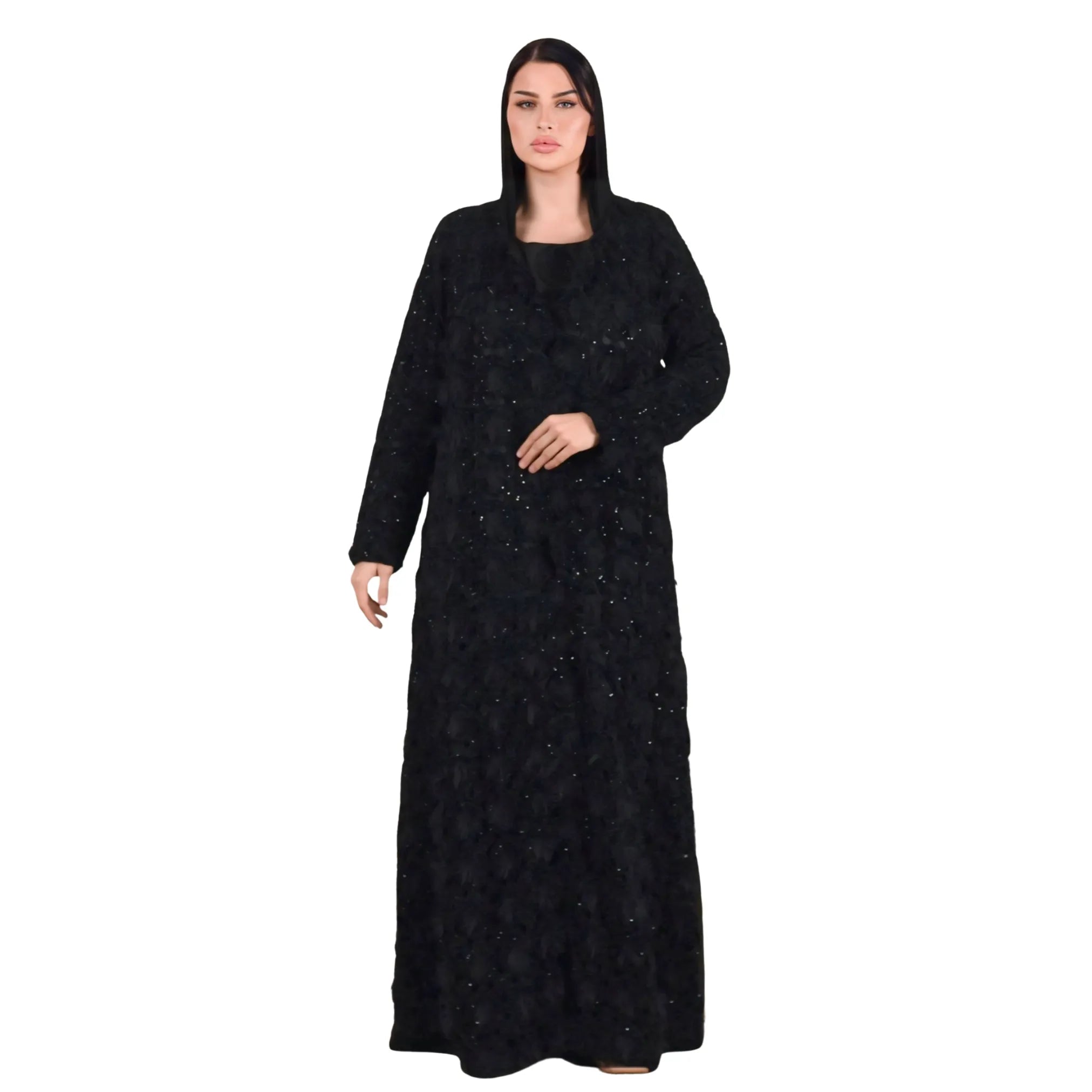 Woman wearing a black long abaya on a white background