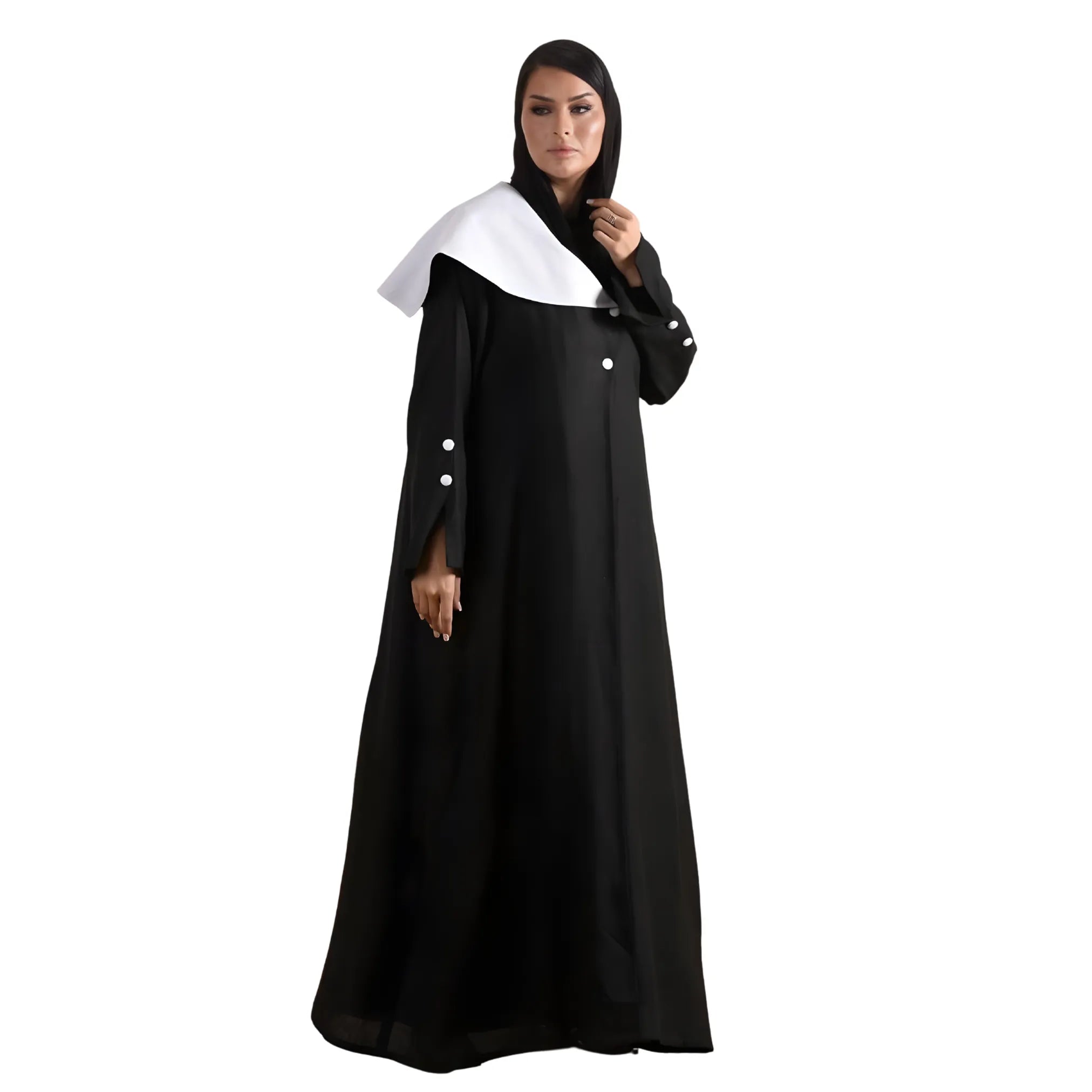 Woman wearing a black and white abaya with a chiffon scarf on a white background
