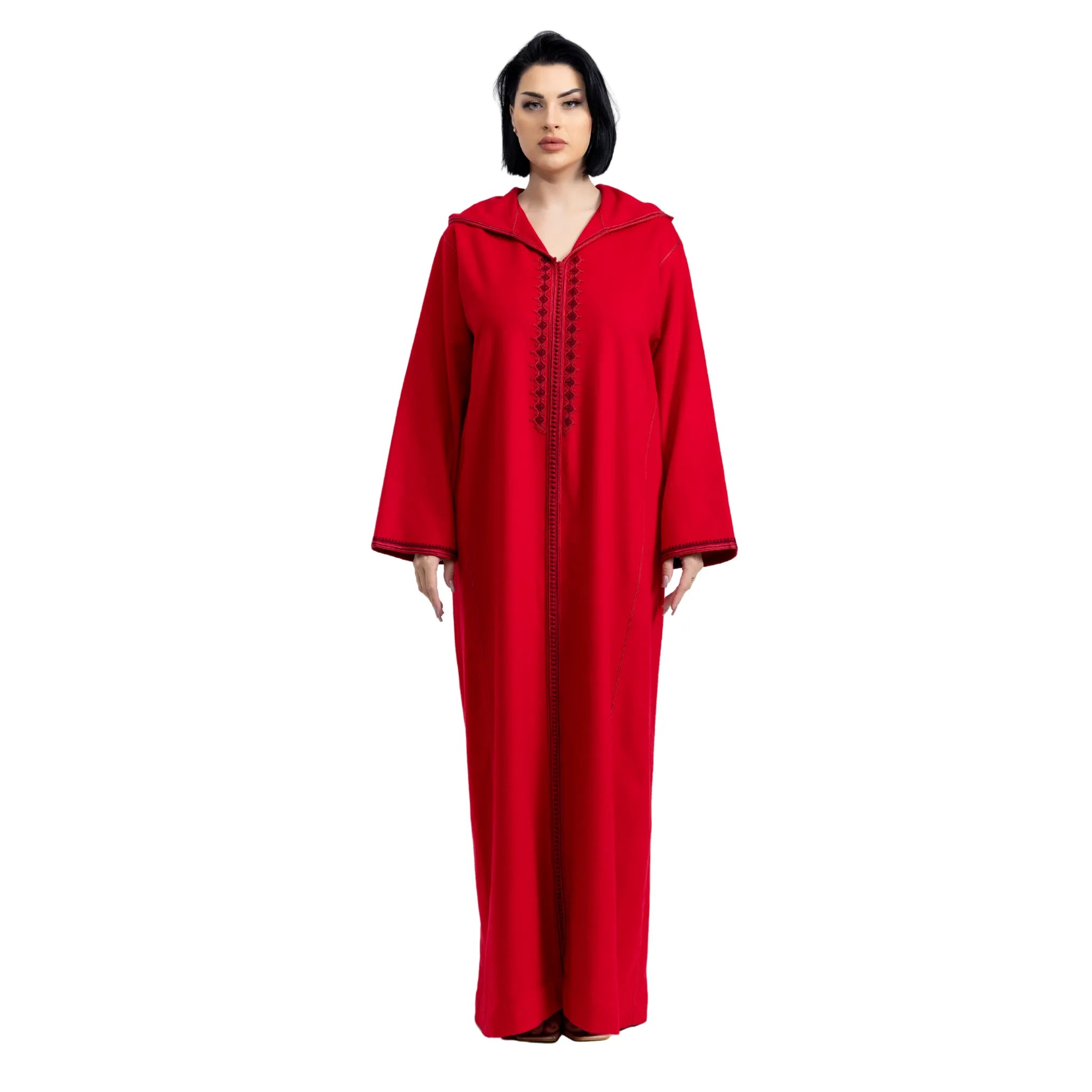 Woman wearing a red jalabiya with a white background
