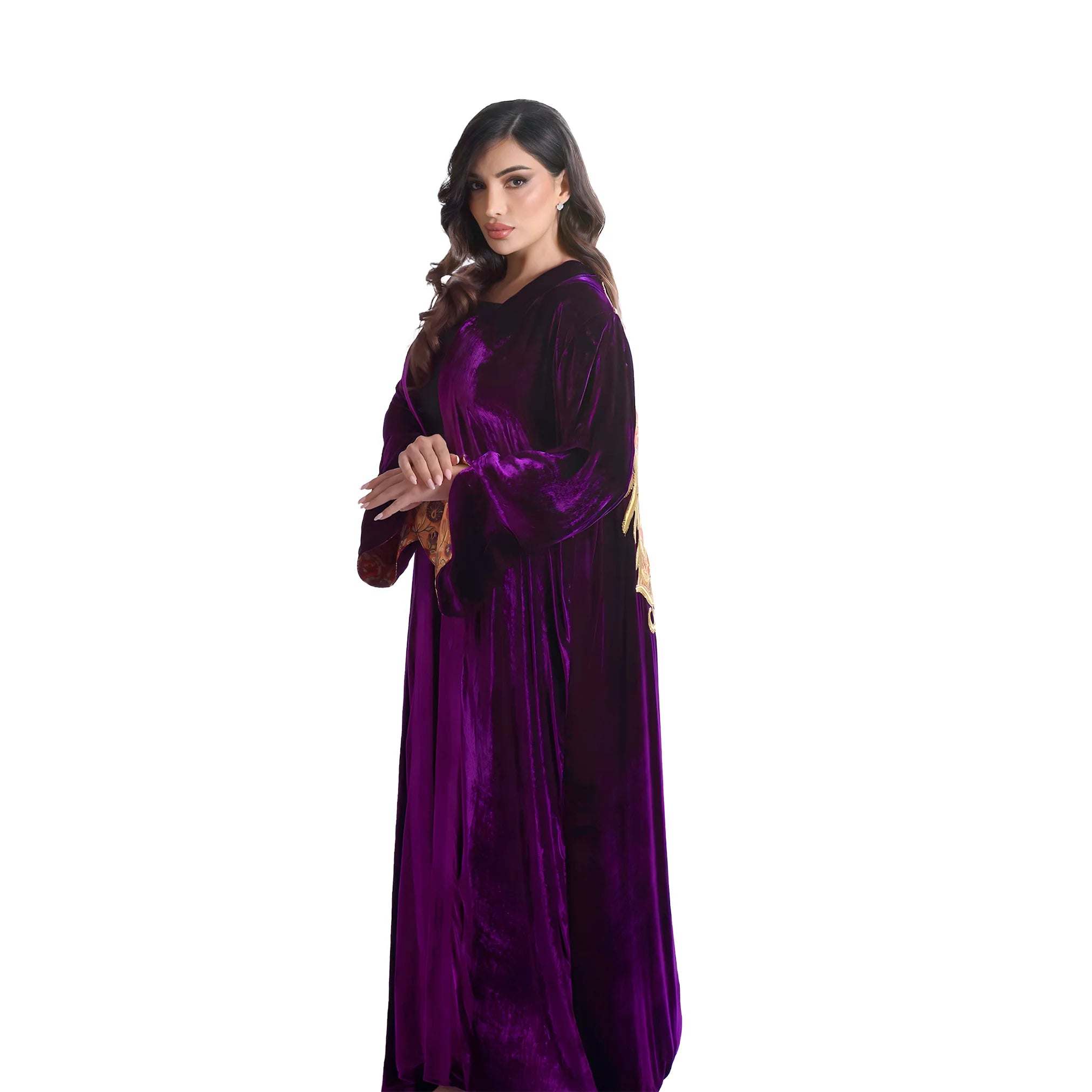Woman wearing a purple velvet abaya on a white background
