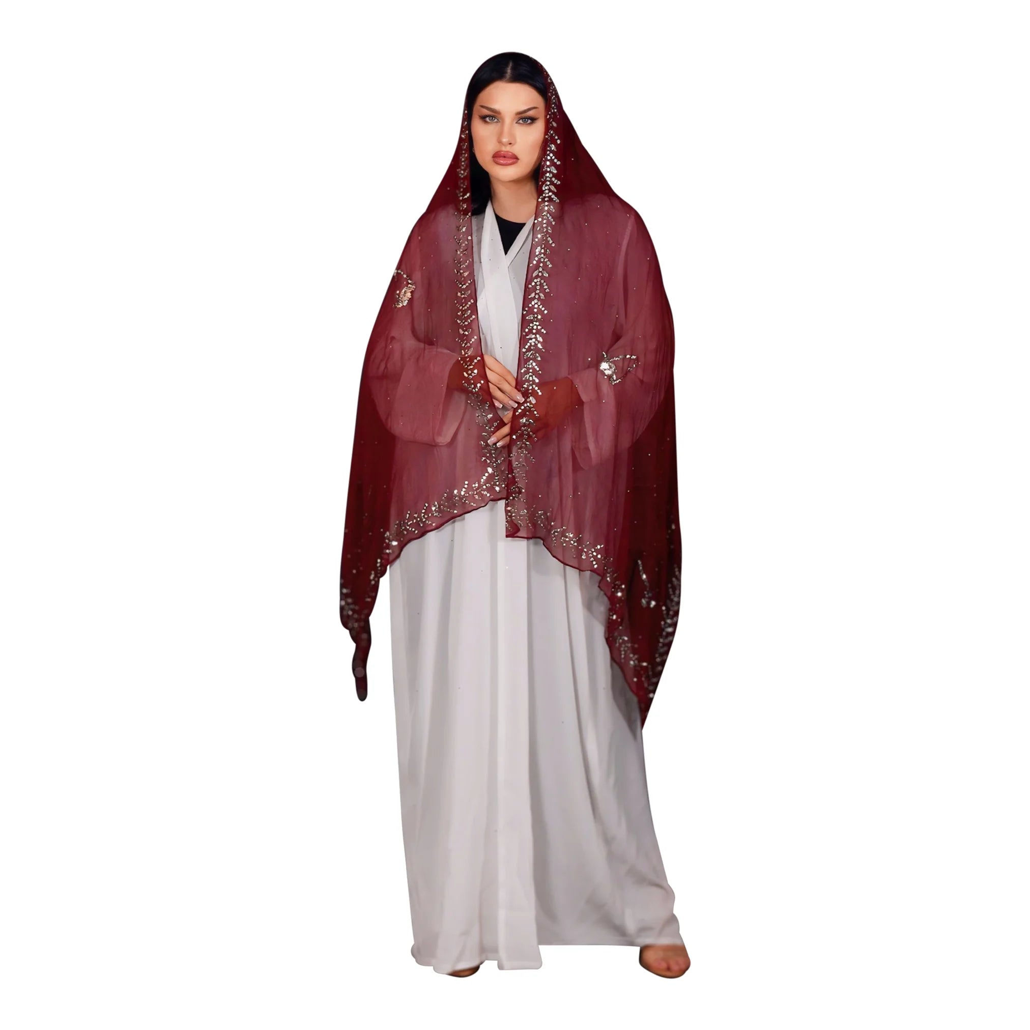 Woman wearing a white abaya with a red shawl on a white background. Qatar National day