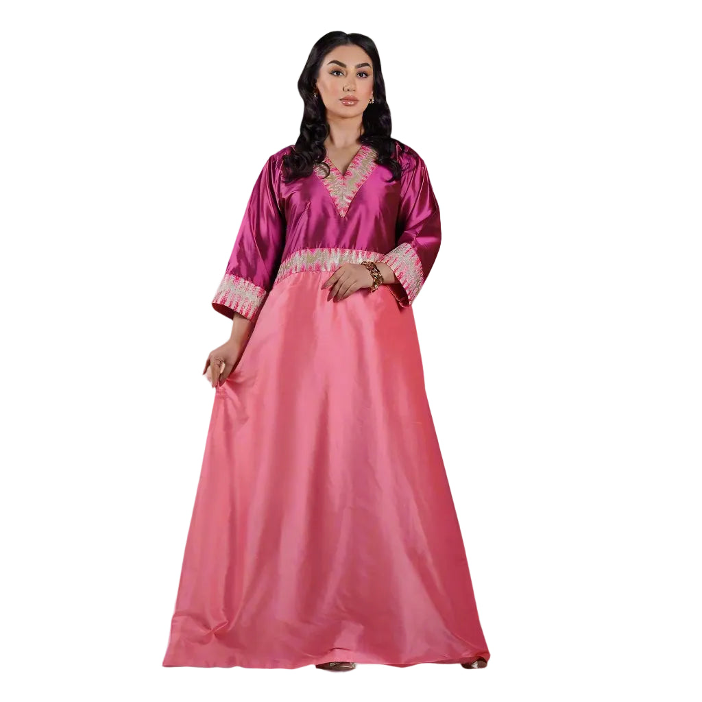 Woman wearing a pink satin dress with white trim on a white background