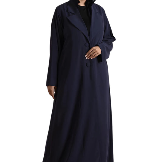 Navy blue abaya worn by a women on a white background