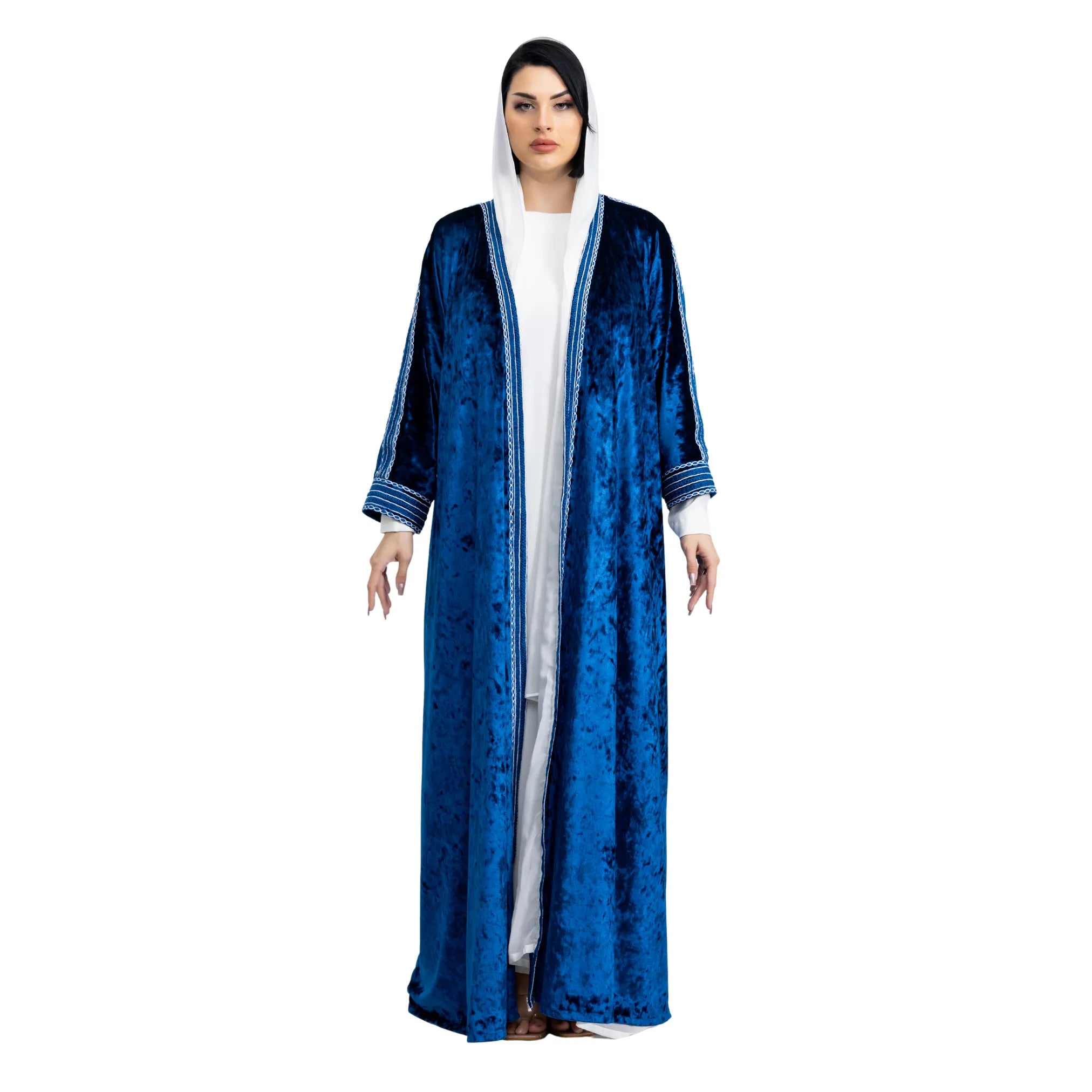 Woman wearing a blue abaya with white inner garment on a white background