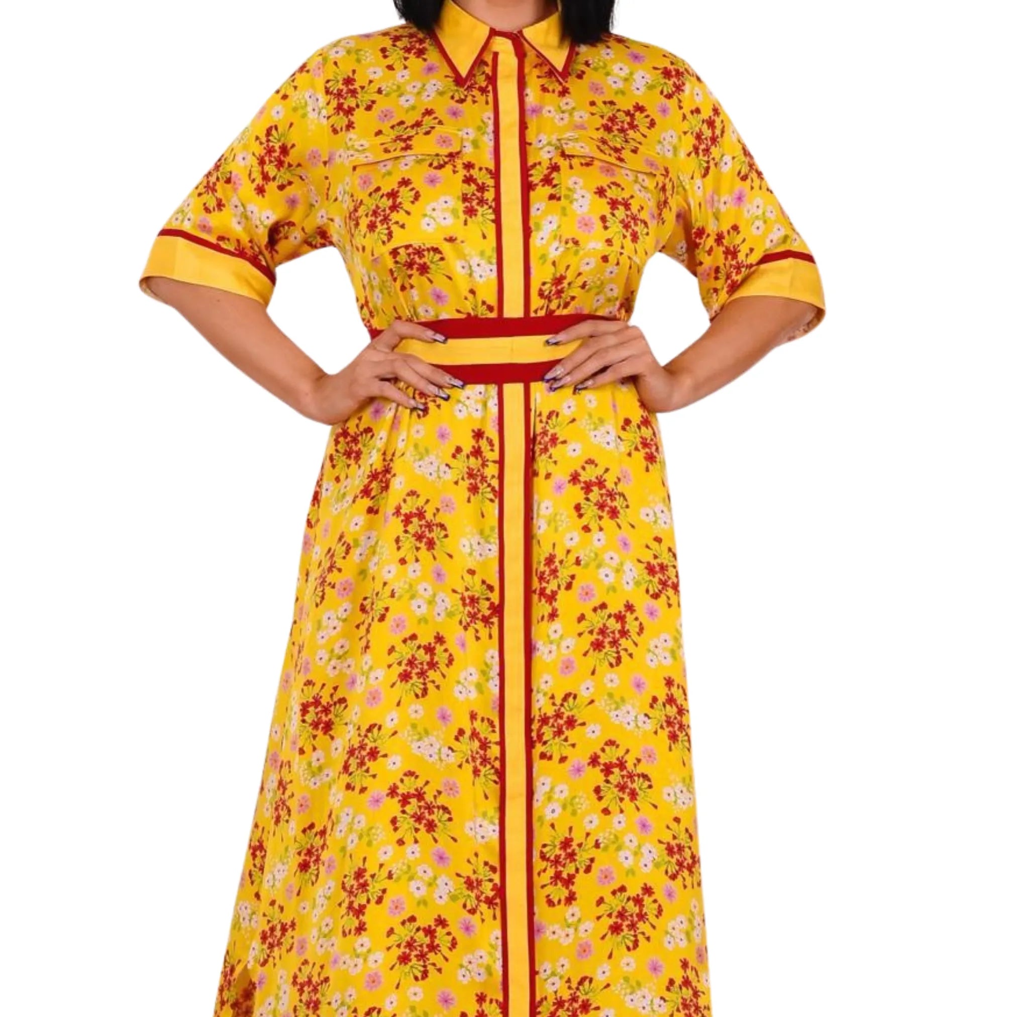 Yellow floral dress with a red belt on a white background