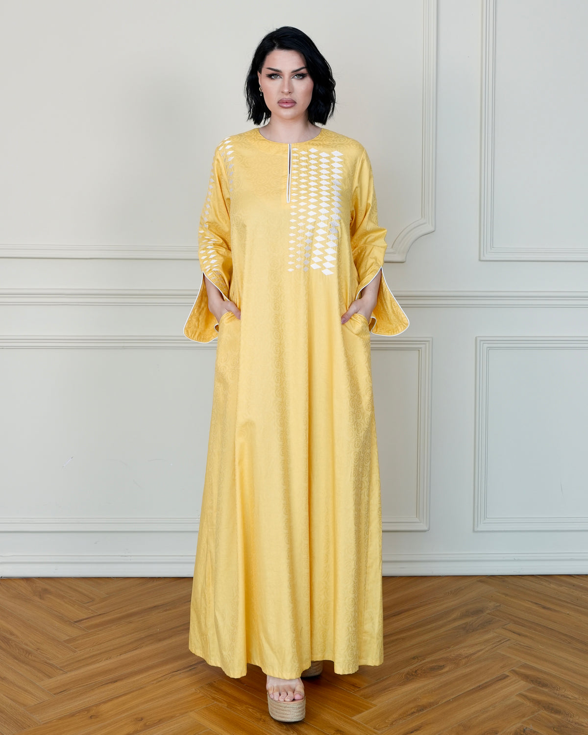 Patterned Yellow Jalabiya with White Embroidery Designs and Side Pockets