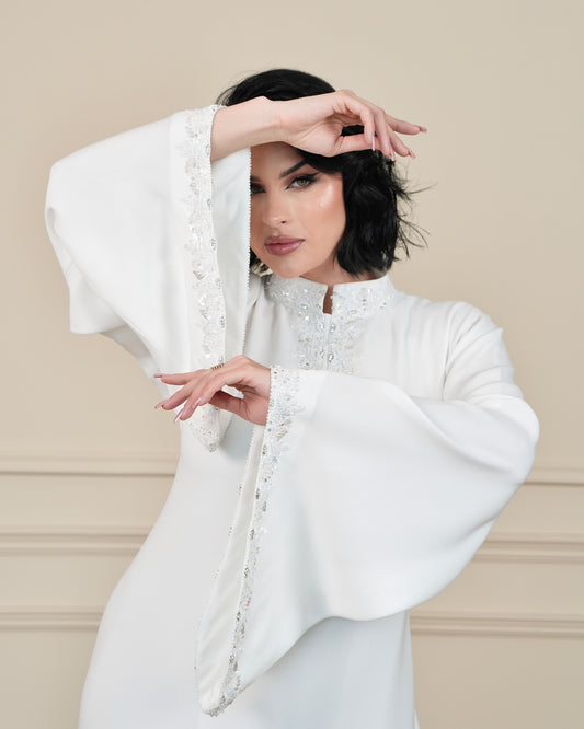 Elegant White Dress with Embellished Bell Sleeves