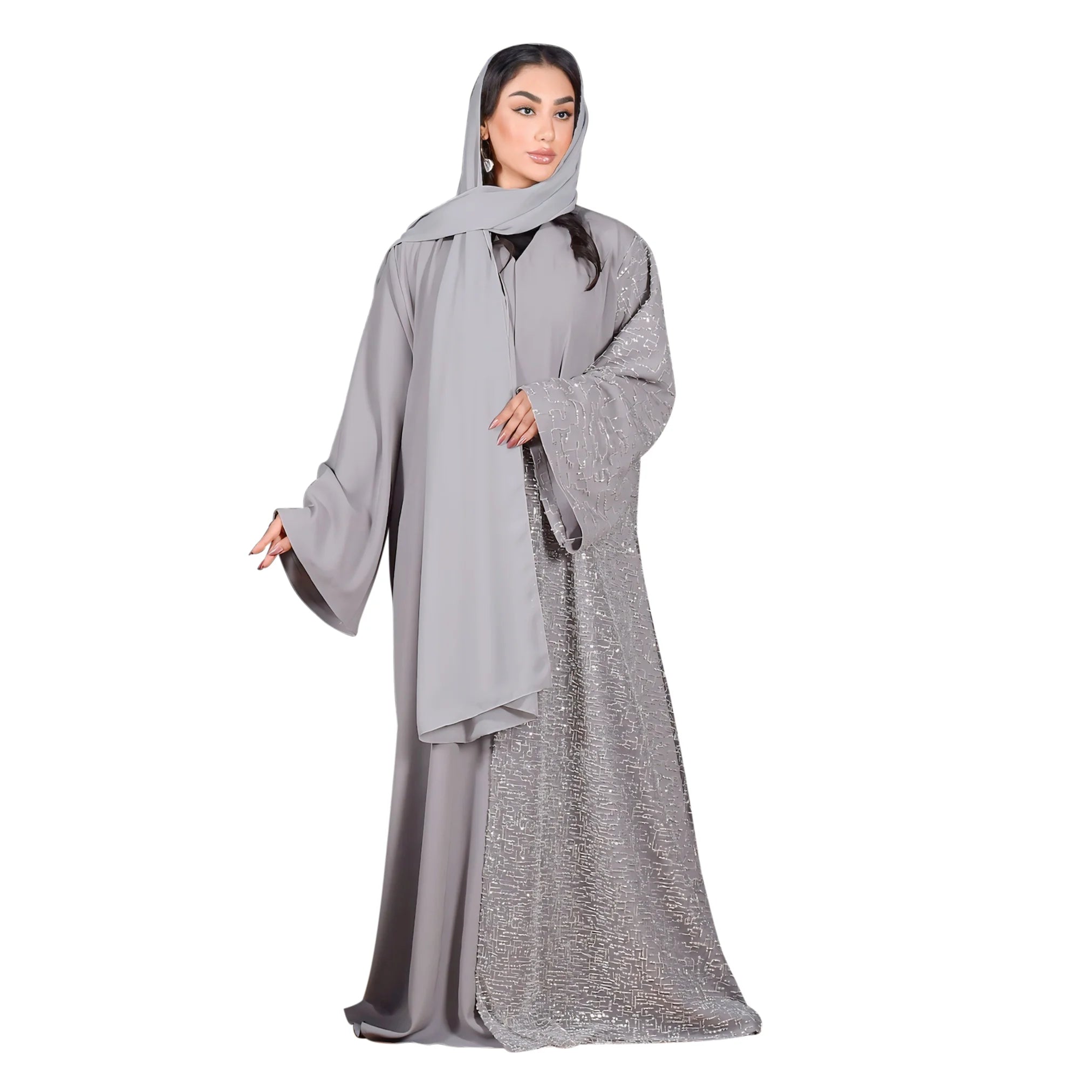 Woman wearing a gray abaya with a hood on a white background